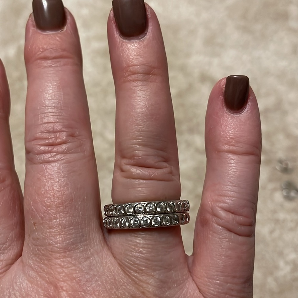 Lot of 2 stackable sterling silver and white zircon eternity band rings
